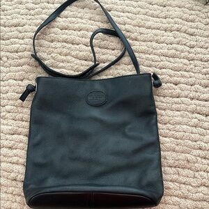 Black Messenger Bag with Adjustable Strap and Rectangular Shape